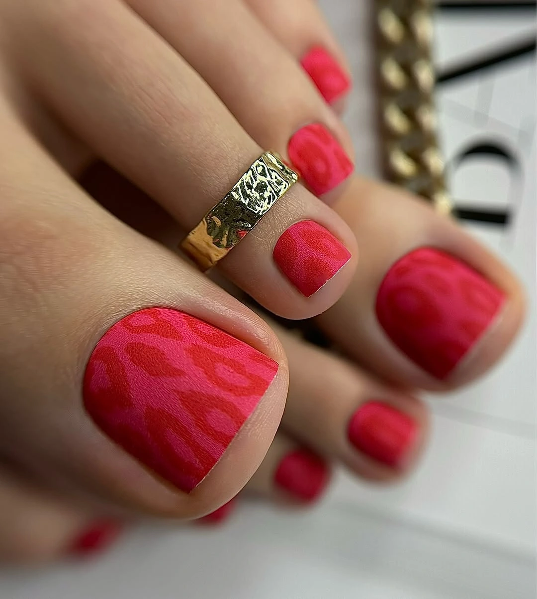 august toe nails 2026 Velvet Raspberry with Modern Animal Texture