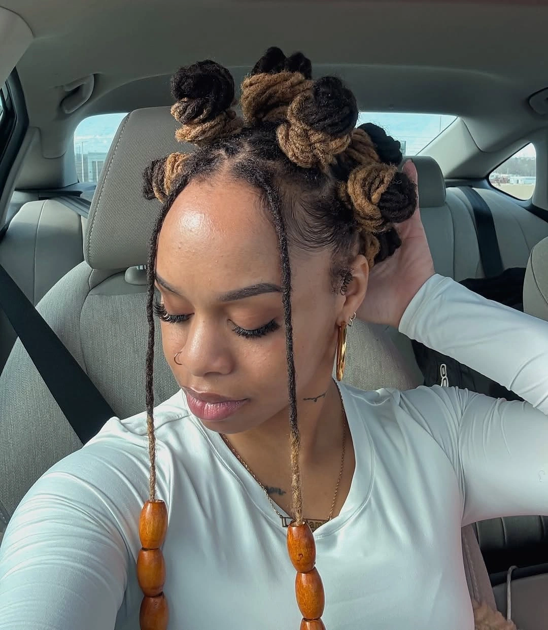 bantu knots hairstyles Soft Two-Tone Knots with Wooden Bead Details