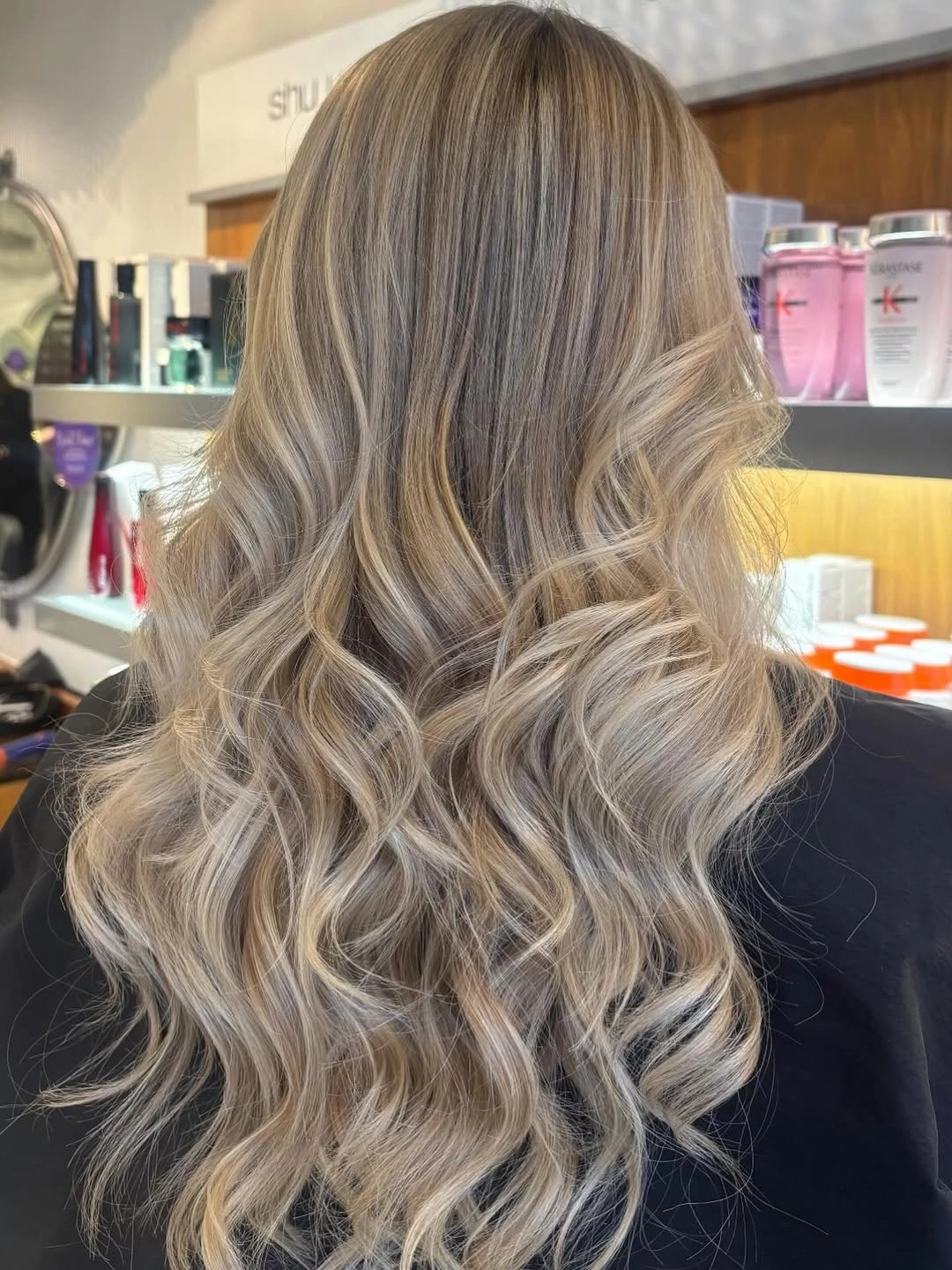 beige blond hair color Airy Beige Blonde Waves With Silky Champagne Dimension