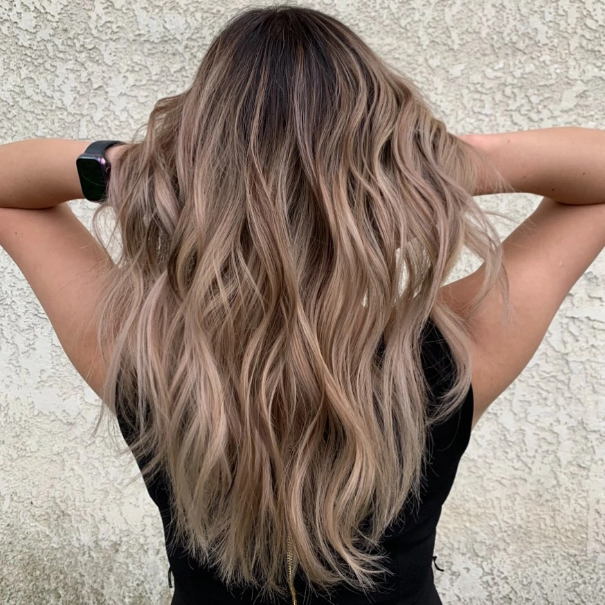 beige blond hair color Soft Sandy Blonde With Lived-In Brightness