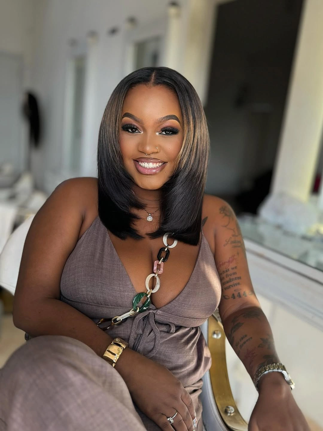 bob hairstyles for black women Layered Glam Bob With Soft Face-Framing Volume