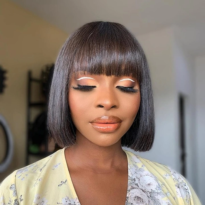bob hairstyles for black women Rounded French Bob With Full Feathered Bangs