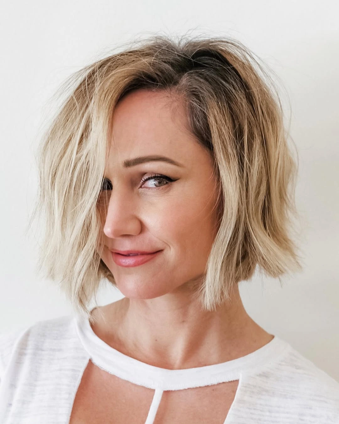 bobbed haircut for women Textured Blonde Bob with Effortless Beachy Movement