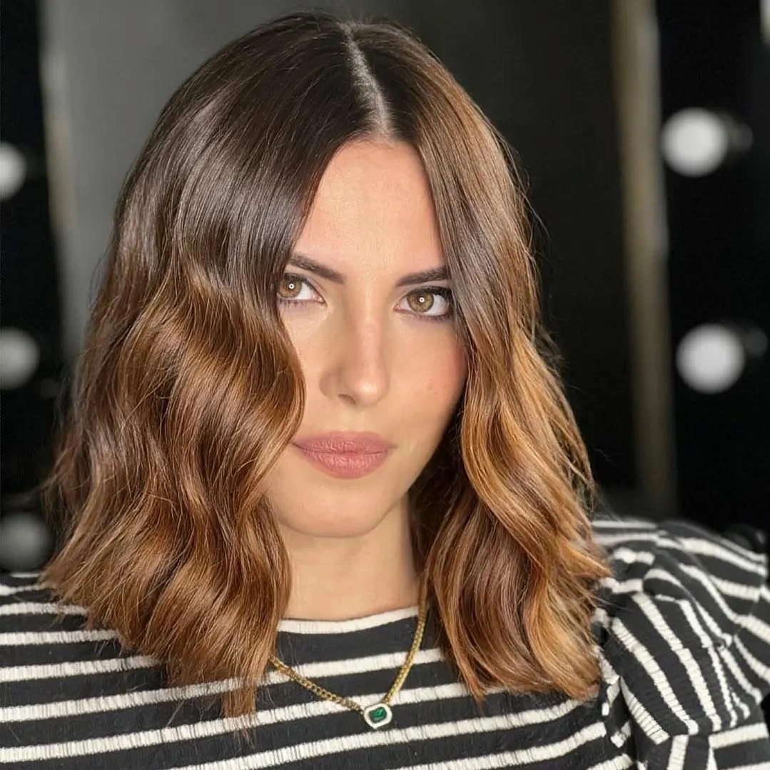 bobbed haircut for women Glossy Wavy Lob with Dimensional Brunette Color