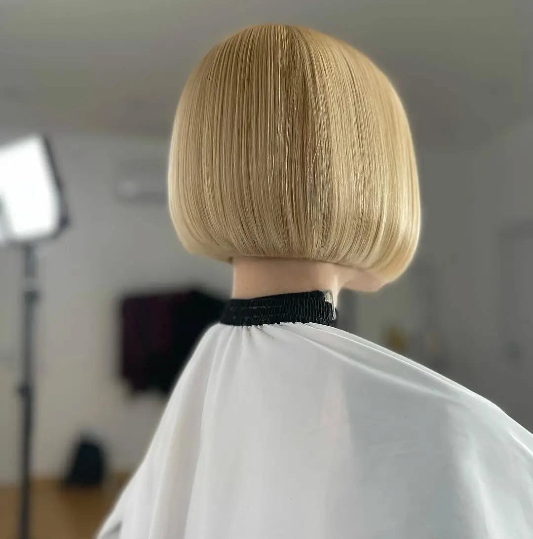 bobbed haircut for women Classic Blonde Bell Bob with Couture Precision