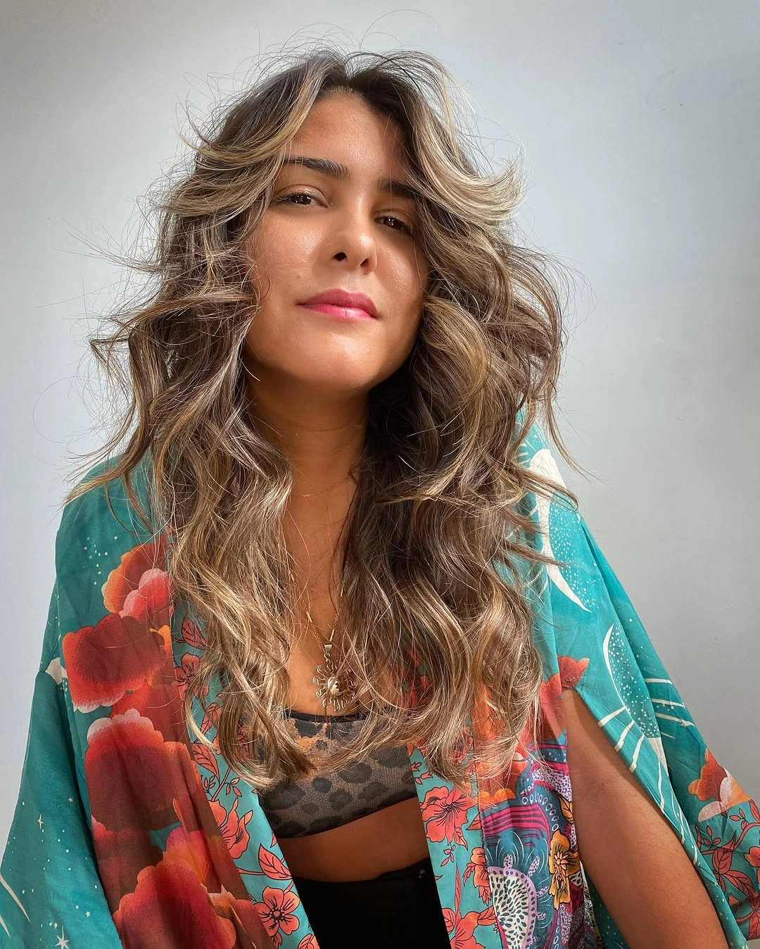 body waves hairstyle Airy Layered Waves With Sun-Kissed Dimension
