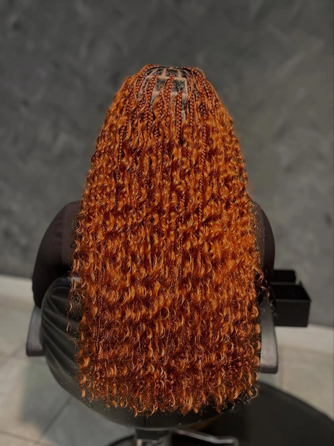 bora bora braids hairstyle Glossy Copper Curls Full of Vibrant Energy