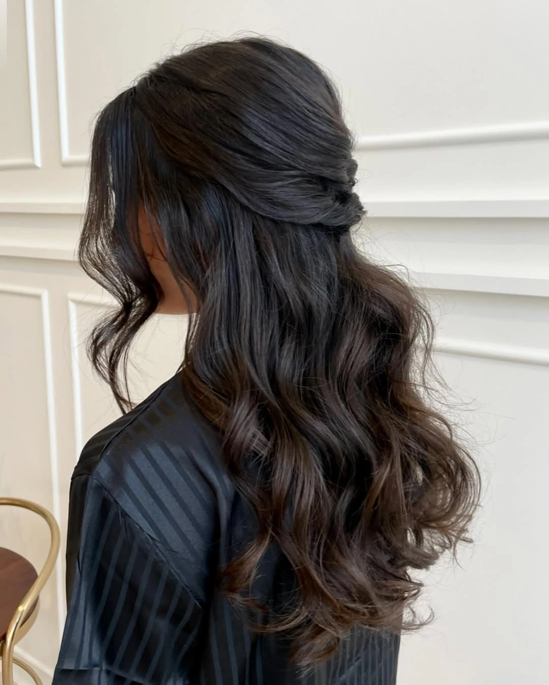 bridesmaid hairstyling Glossy Half-Up Waves with Effortless Movement