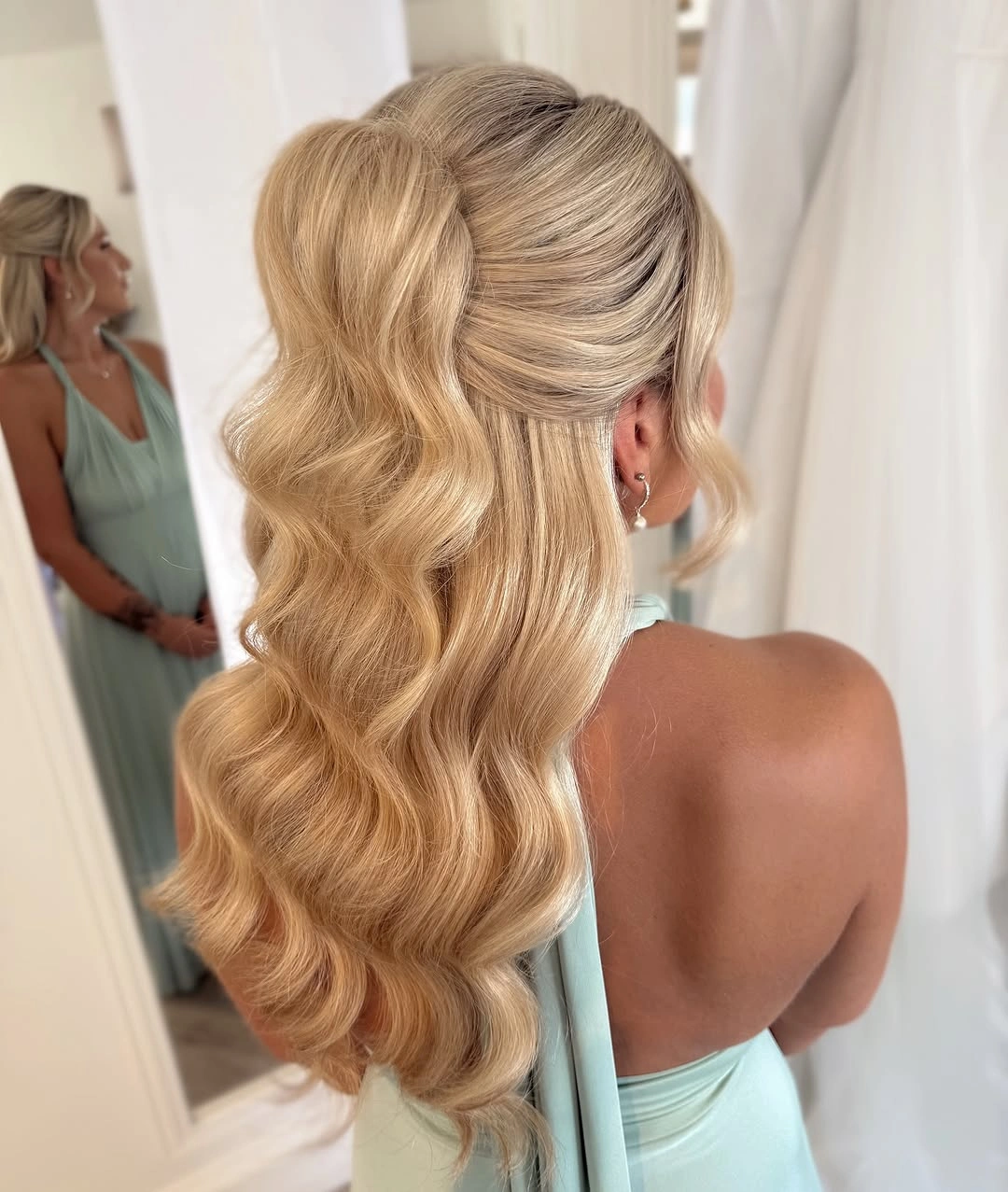 bridesmaid hairstyling Hollywood Half-Up Waves with Modern Glamour