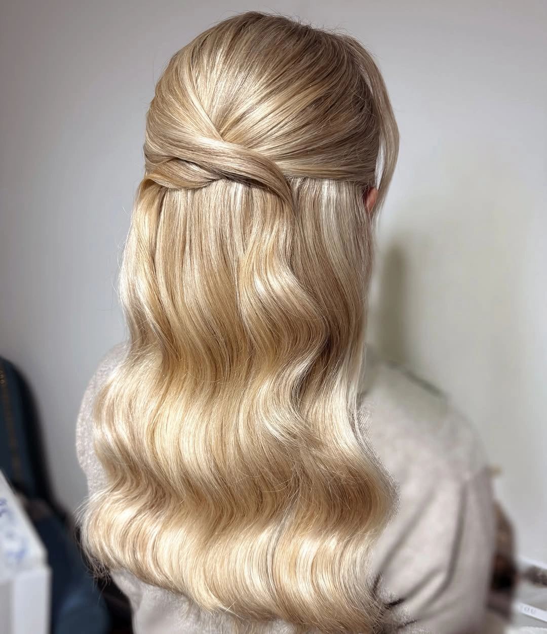 bridesmaid hairstyling Classic Twisted Half-Up Waves with Timeless Elegance
