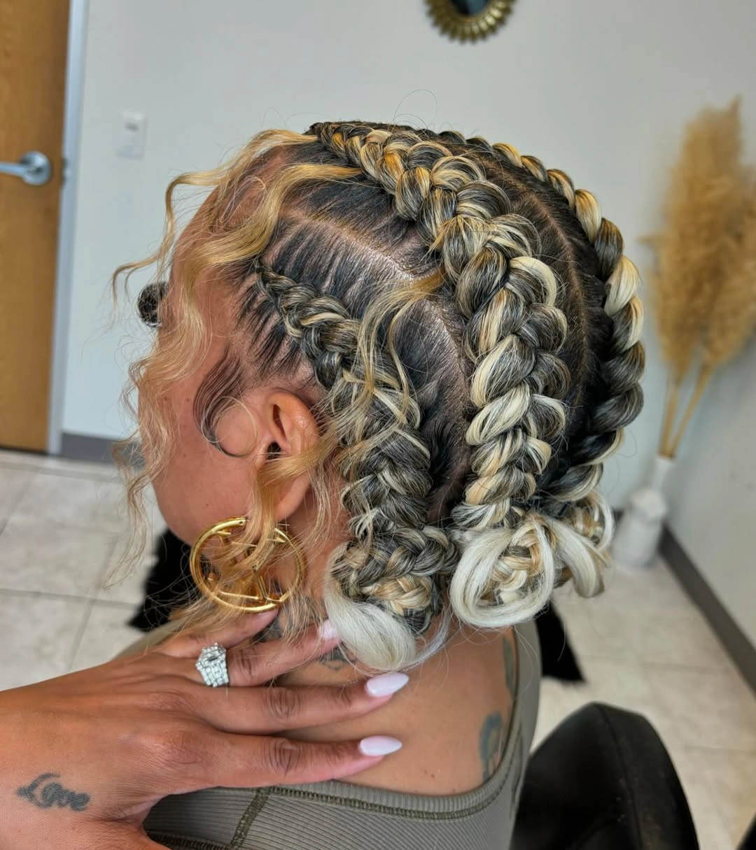 butterfly braids hairstyle Dimensional Blonde Butterfly Braids with Chic Low Buns