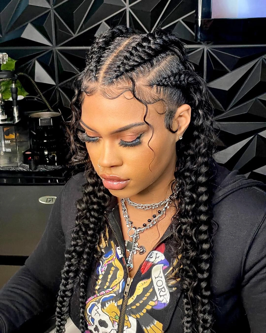 butterfly braids hairstyle Statement Butterfly Braids with Sleek Middle Part