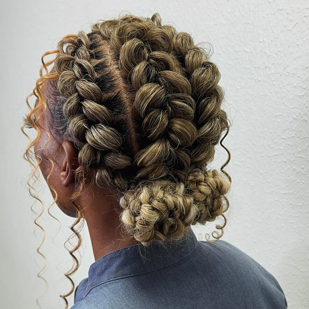 butterfly braids hairstyle Soft Blonde Butterfly Braids Gathered Into Elegant Low Buns
