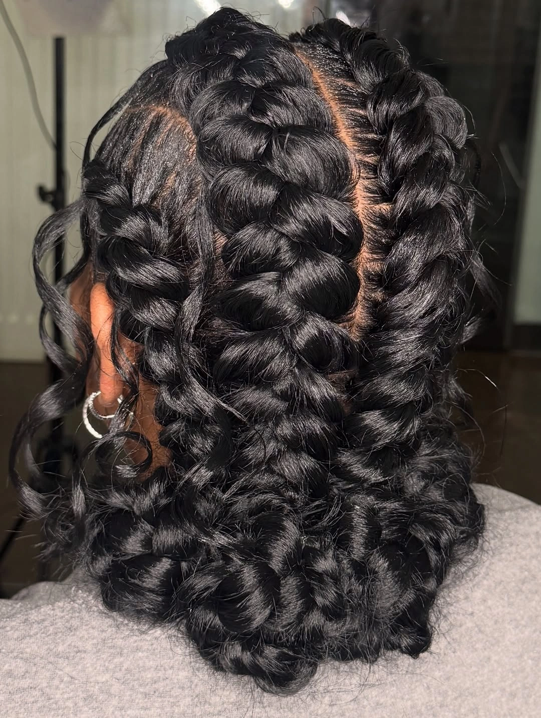 butterfly braids hairstyle Glossy Butterfly Braids with Defined Spiral Ends