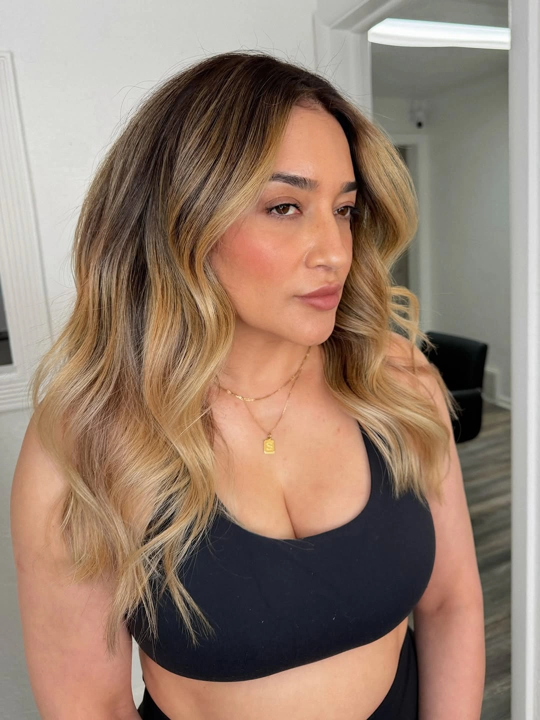 choppy medium layered hair Face-Framing Blonde Ribbons and Soft Center-Parted Layers