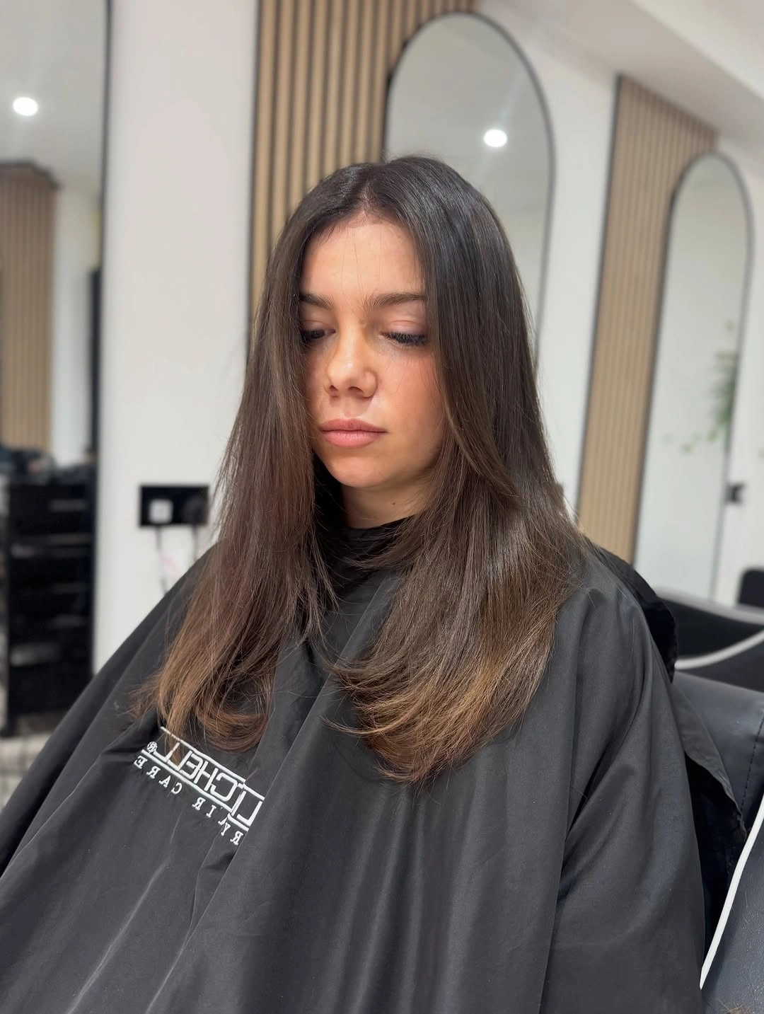 choppy medium layered hair Polished Brunette Layers with Curved Ends
