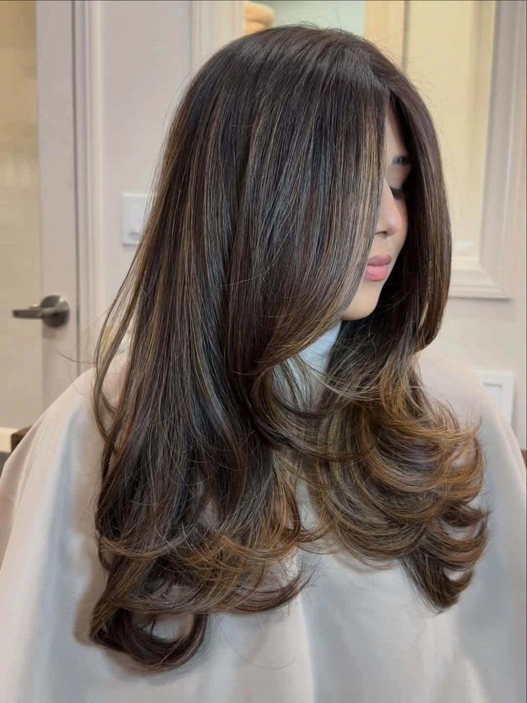 dimensional brunette hair color Cool Beige Brunette with Feathered Layers