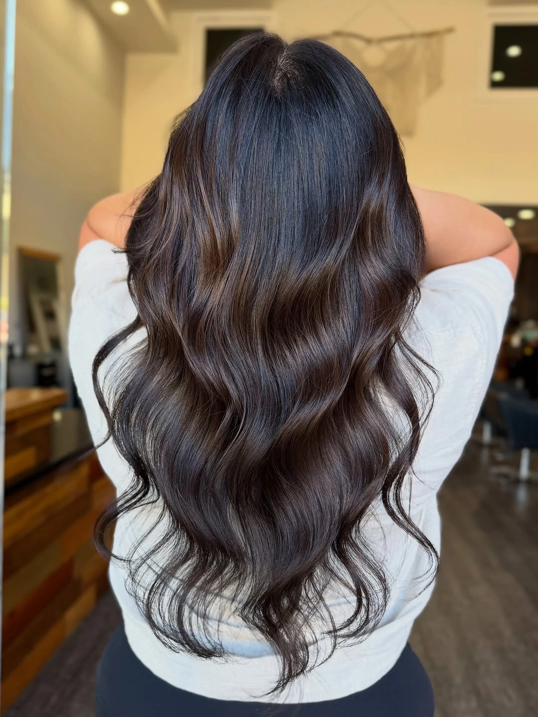 dimensional brunette hair color Classic Dark Brunette with Soft Glossy Waves