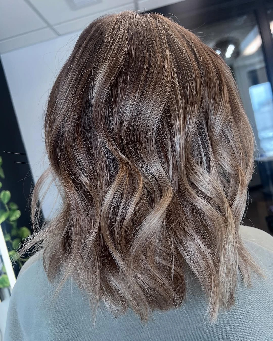 dirty blonde hair color Dimensional Beige Waves With Lived-In Highlights