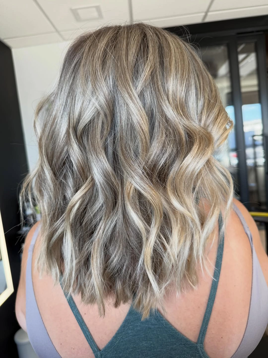 dirty blonde hair color Beachy Dirty Blonde Blend With Soft Balayage Movement