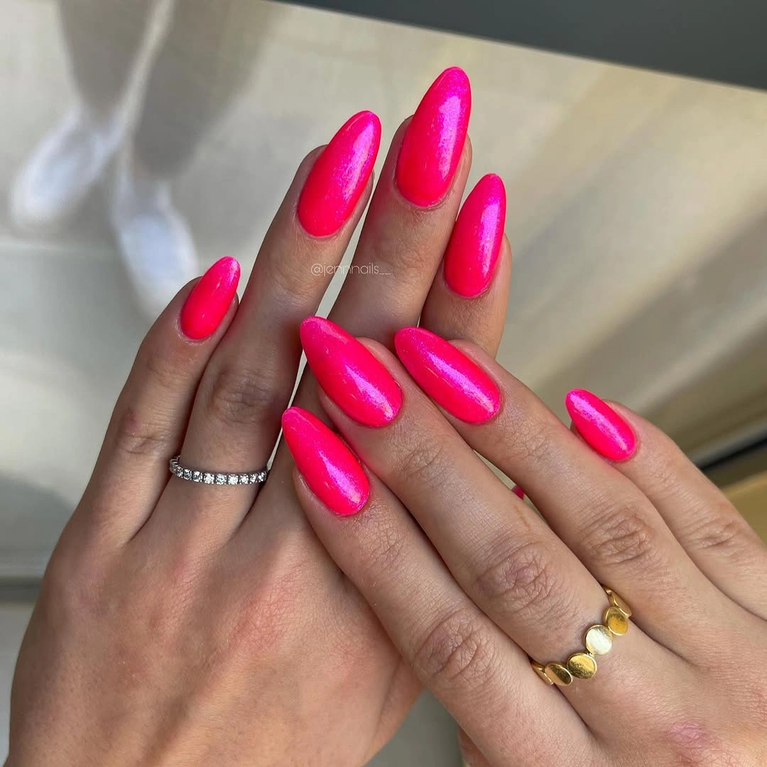 hot pink almond nails with glossy finish