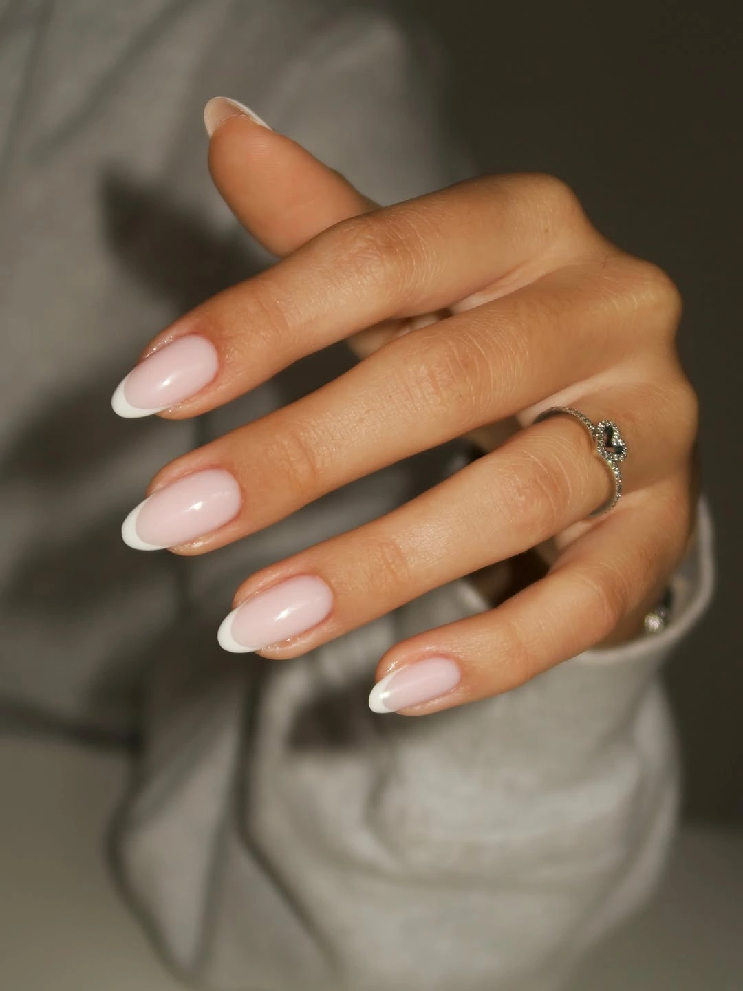 pale pink almond nails with glossy shine