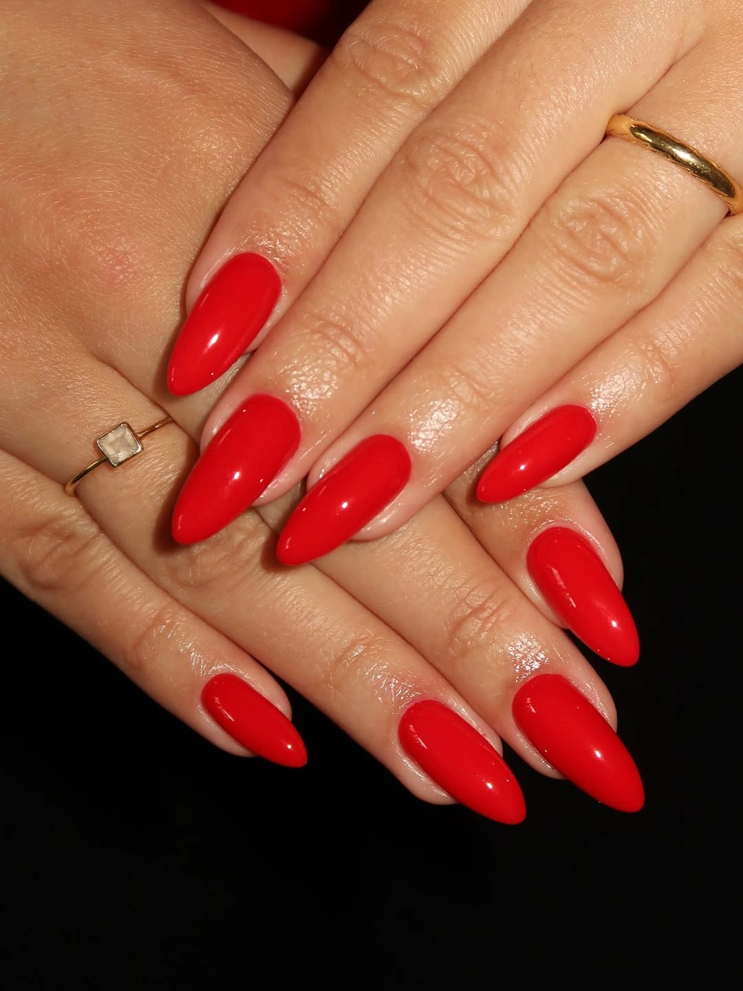 classic red almond nails with glassy shine