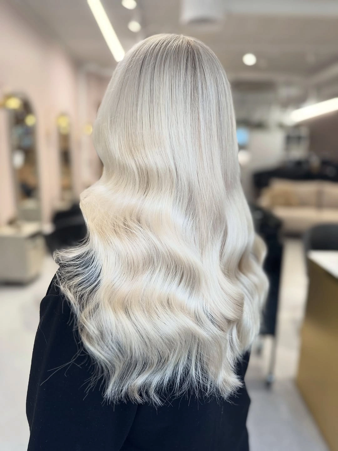 Fall blonde hair colour 2026 Ice Vanilla Blonde with Silky Hollywood Waves