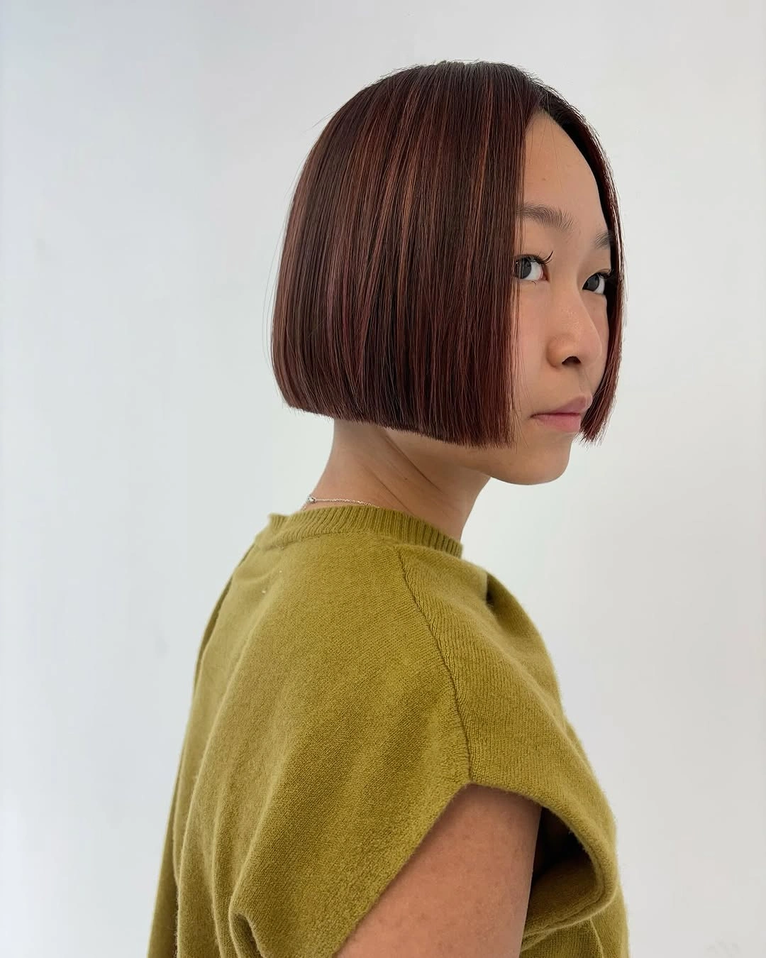 fall bob haircut ideas 2026 Glass Bob With Rich Auburn Shine