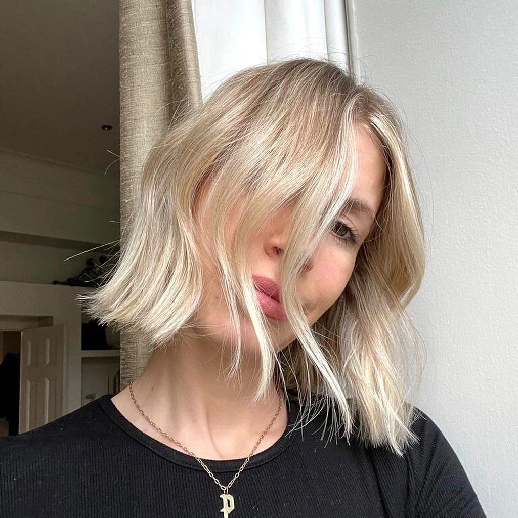 fall bob haircut ideas 2026 Airy Blonde Bob With Soft Curtain Layers
