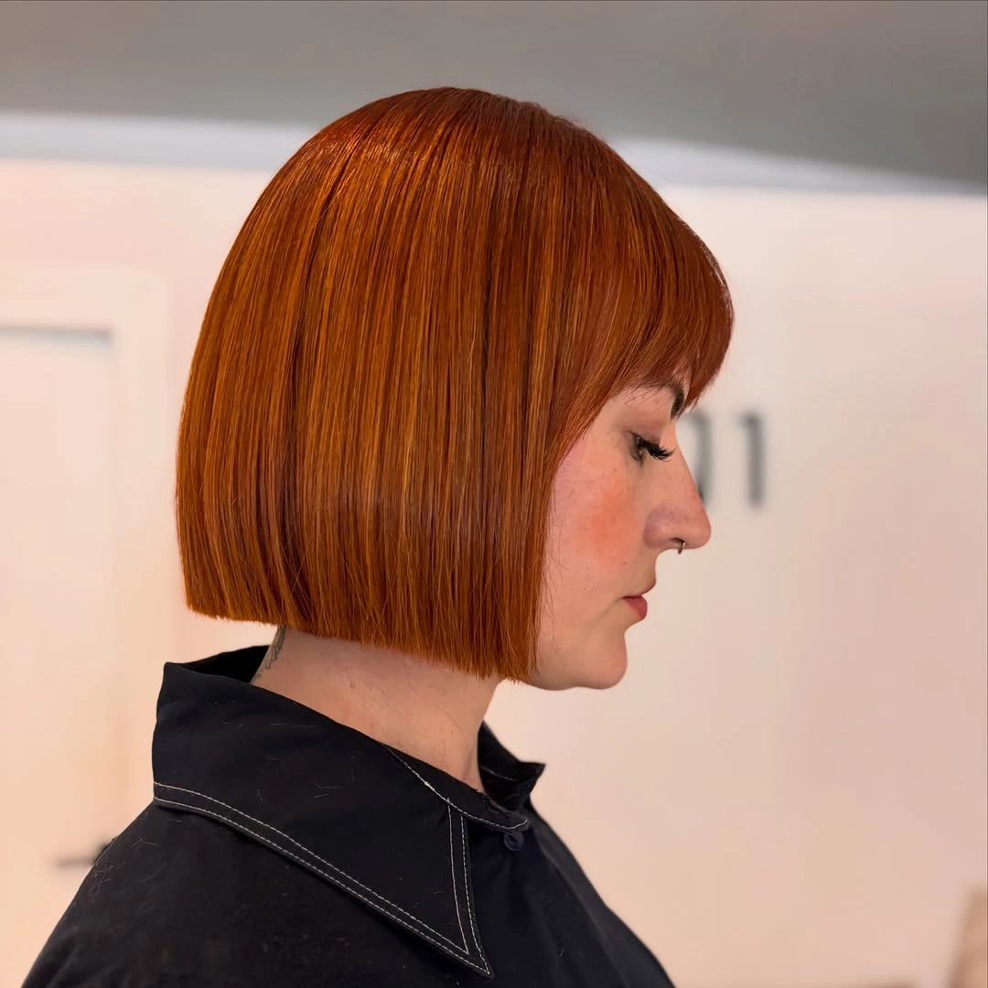 fall bob haircut ideas 2026 Glossy Copper Precision Bob