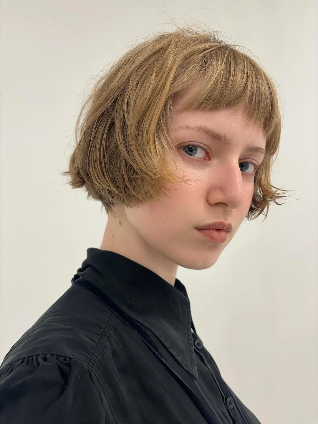fall bob haircut ideas 2026 Textured French Bob With Piecey Baby Bangs