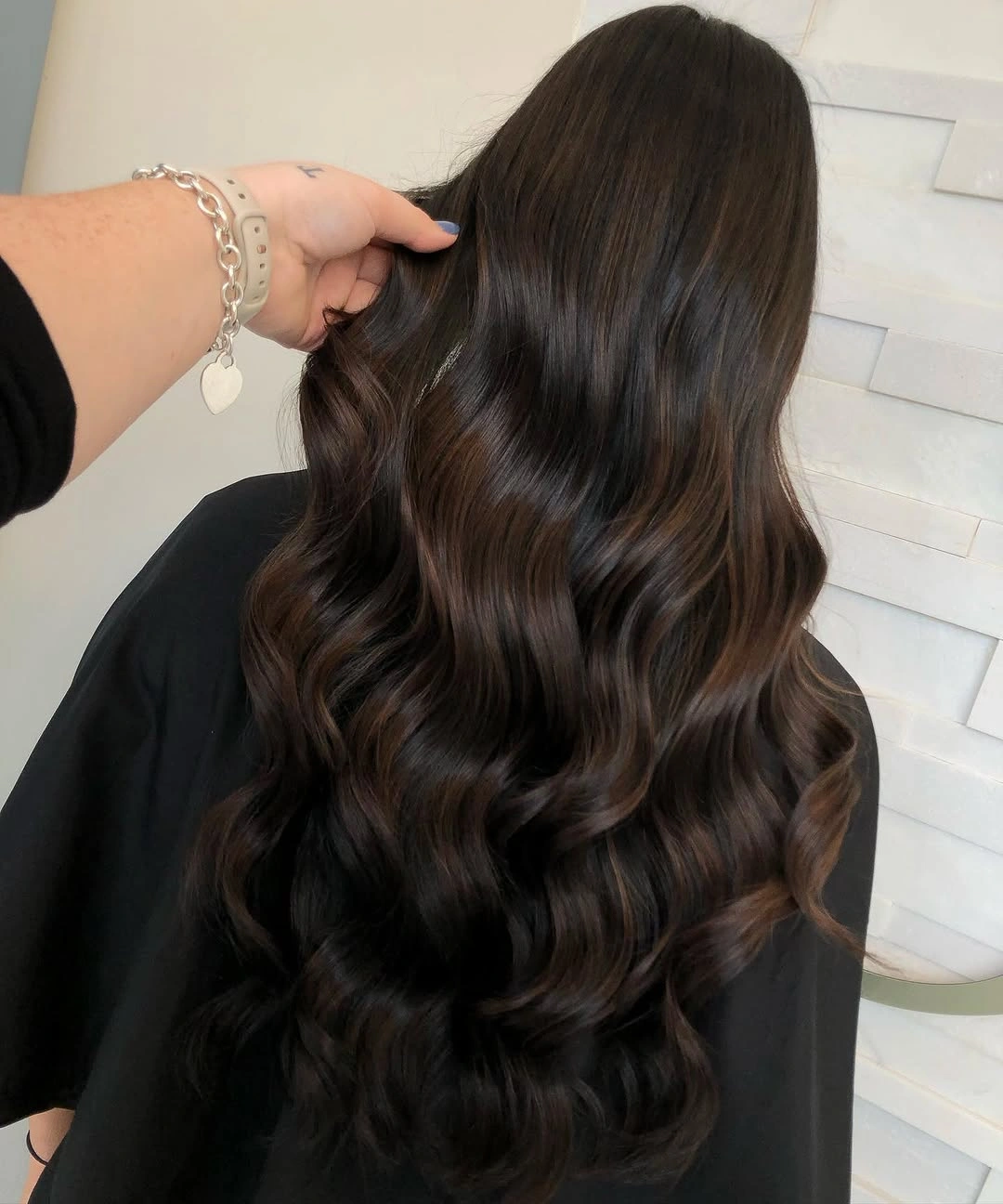 Fall brunette hair colour 2026 Dark Espresso Brunette with Glossy Ribbon Waves