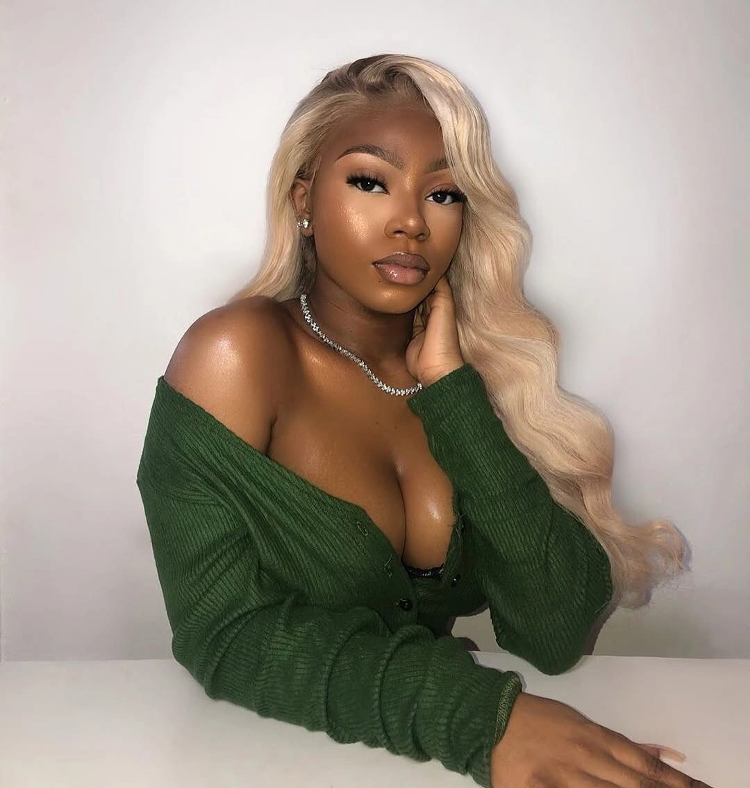 fall hair colors for black women 2026 Soft Champagne Blonde Waves With Luxe Dimension