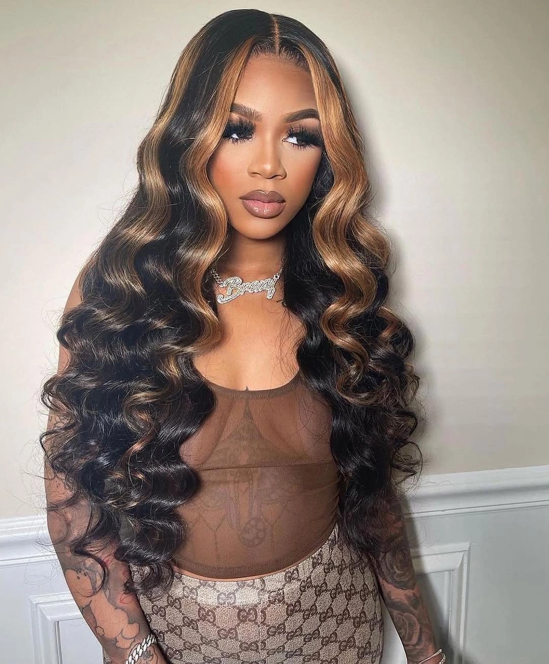 fall hair colors for black women 2026 Golden Face-Framing Ribbons On Rich Brunette Waves
