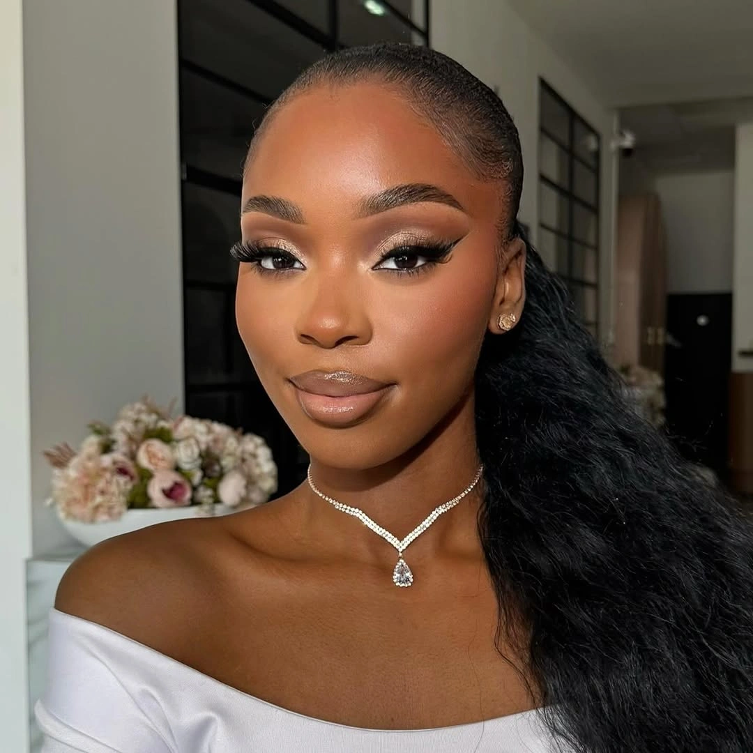 fall hair colors for black women 2026 Elegant Low Ponytail With Silky Black Lengths