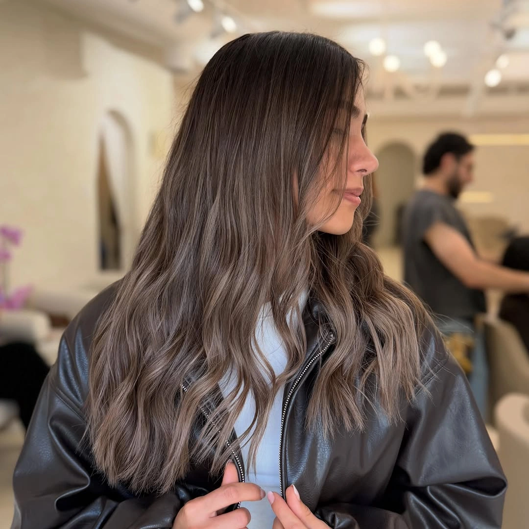 Fall hair colour ideas 2026 Cool Taupe Brunette With Smoky Dimension