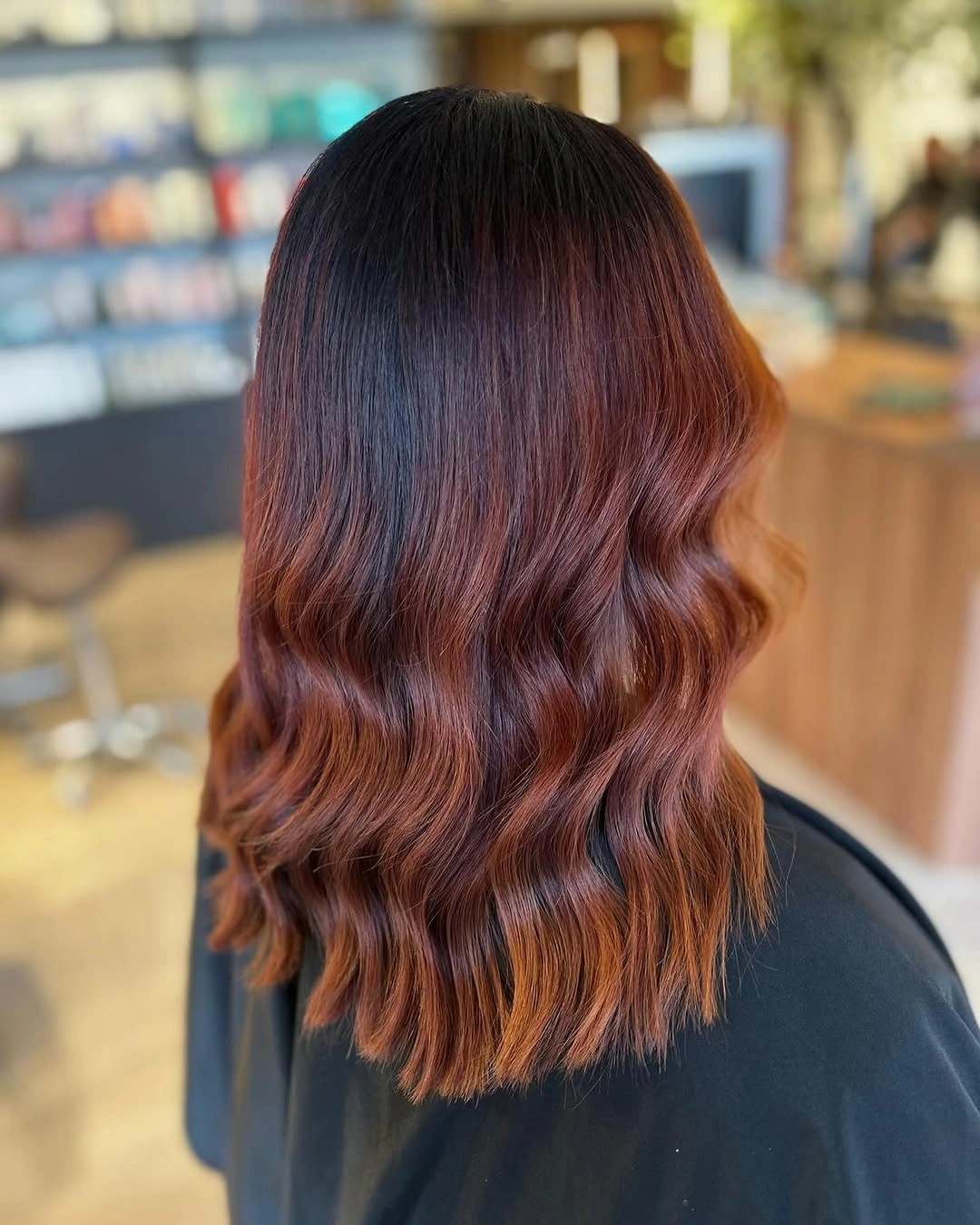 fall haircuts for women 2026 Dark Cherry Balayage on a Modern Midi Cut
