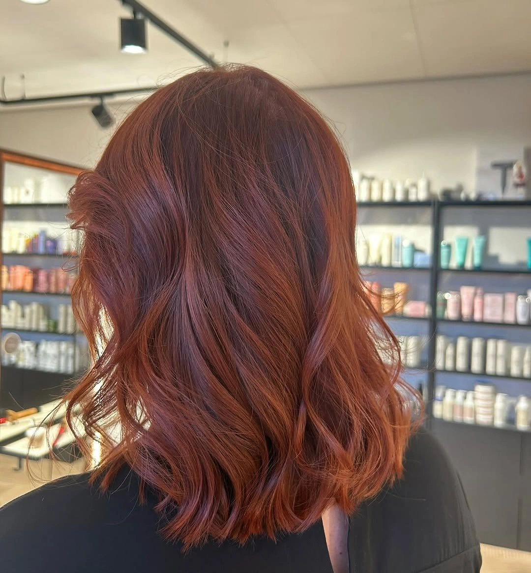 fall haircuts for women 2026 Cinnamon Copper Wavy Lob for Cozy Autumn Days