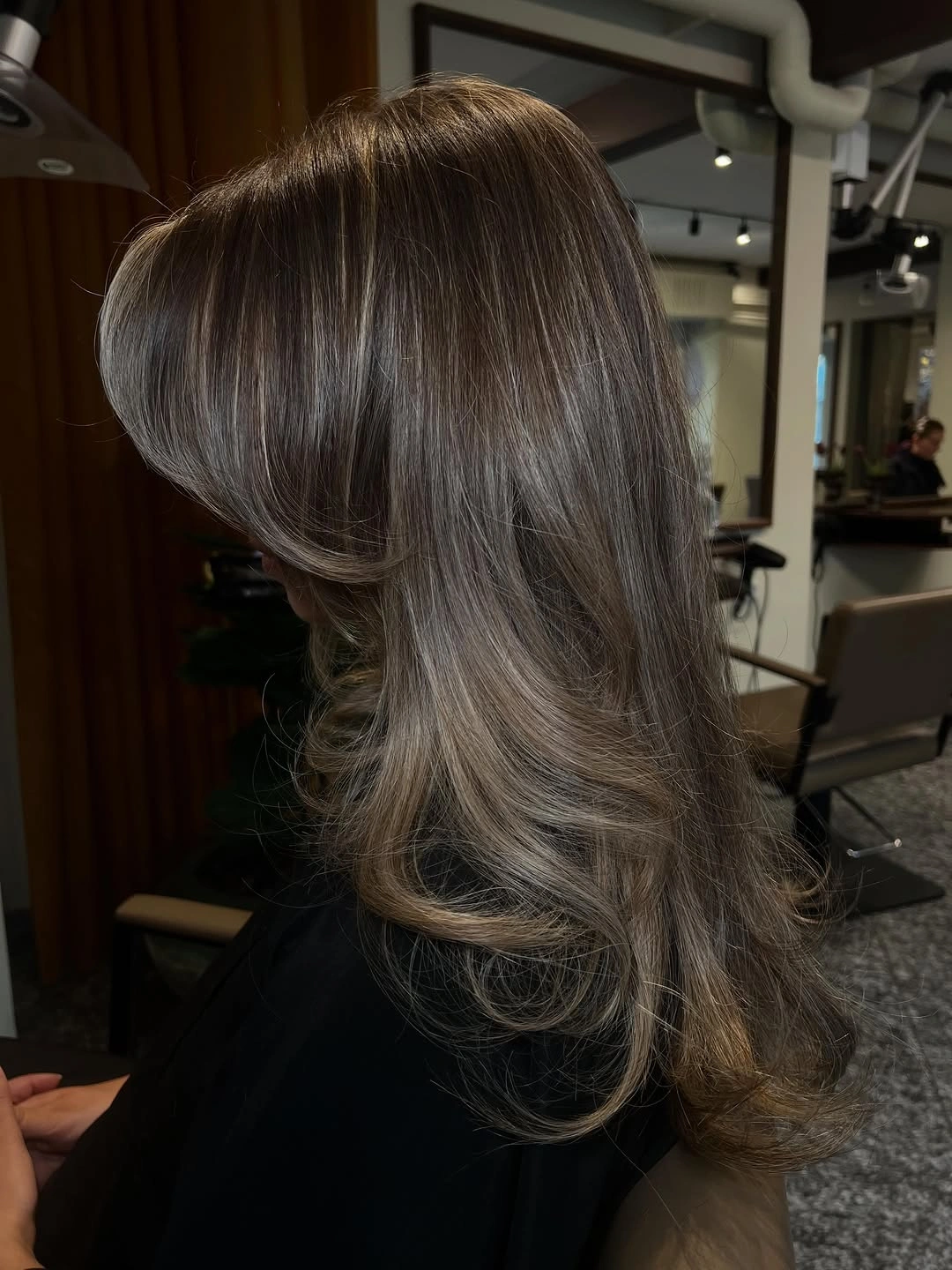 fall haircuts for women 2026 Feathered Espresso Layers with a Luxurious Blowout