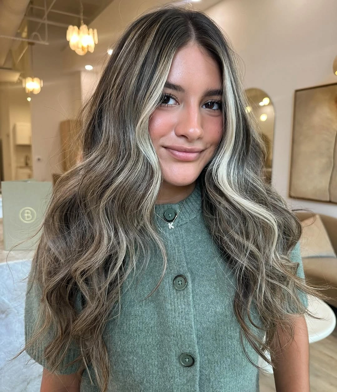 fall hairstyles 2026 Dimensional Brunette Waves With Bold Money Piece Highlights