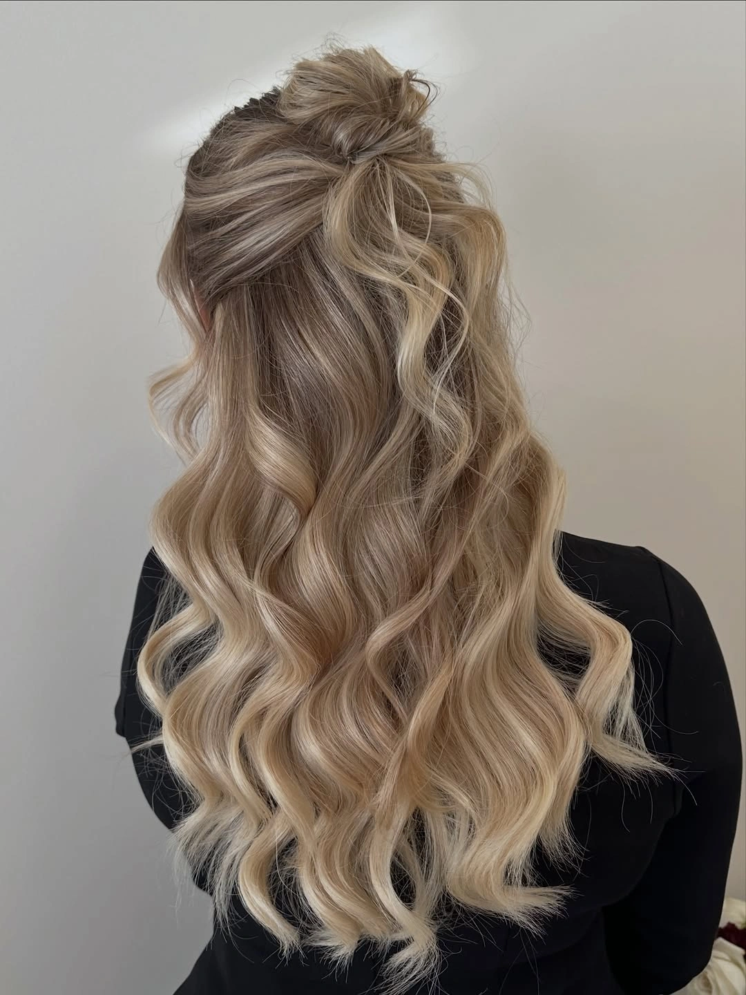 fall hairstyles 2026 Relaxed Textured Half Up Style With Soft Blonde Waves