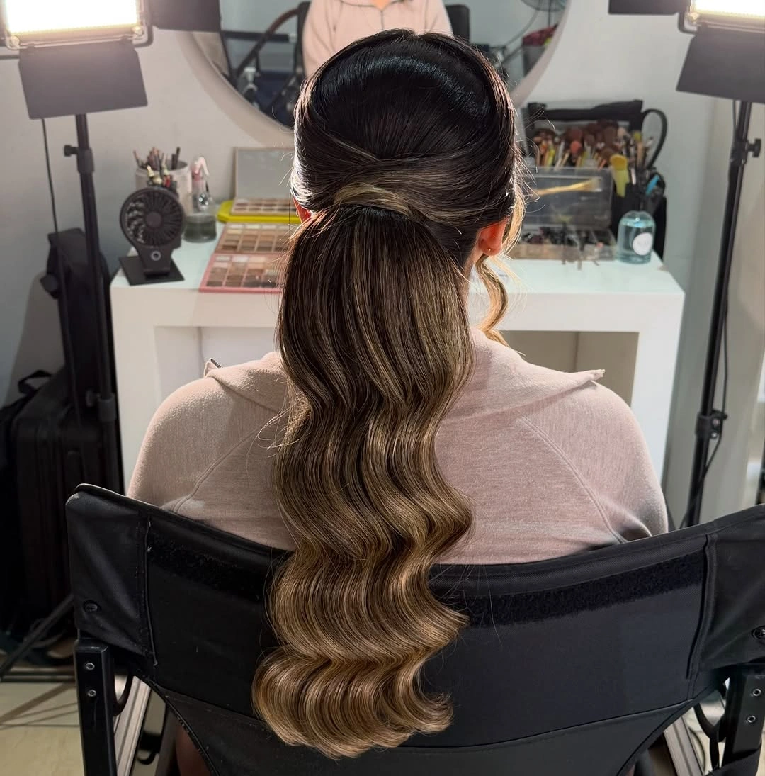 fall hairstyles 2026 Polished Wrapped Ponytail With Hollywood Waves
