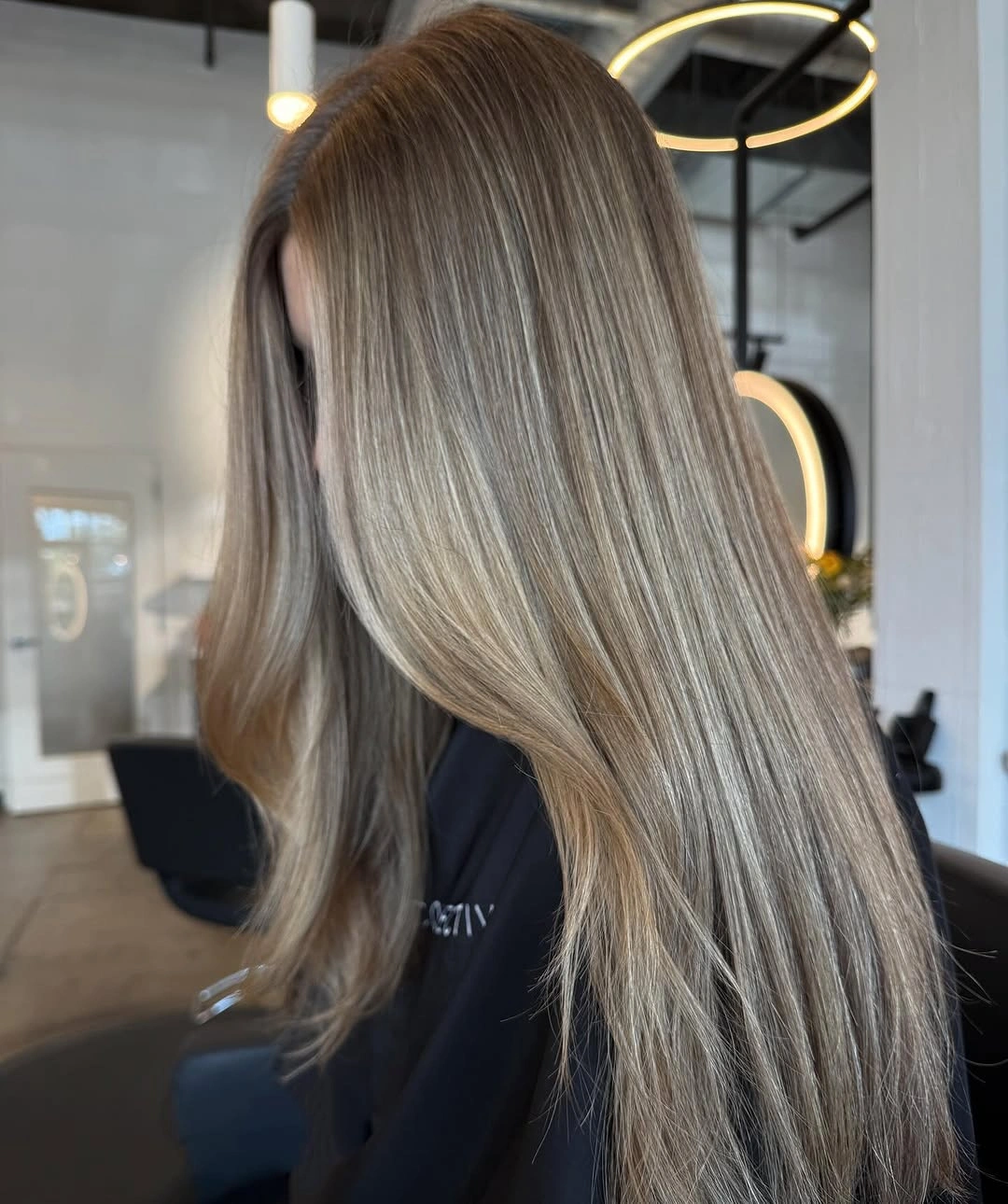 fall hairstyles 2026 Cool Beige Blonde With Seamless Glass Hair Shine