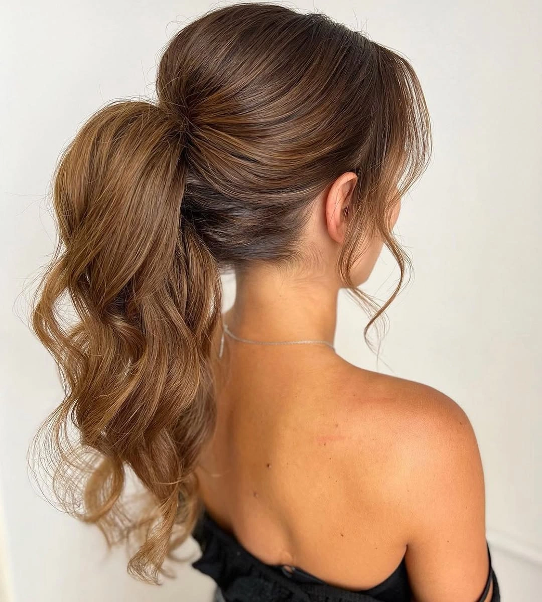 Fall hairstyles for office 2026 Voluminous High Ponytail with Soft Romantic Waves