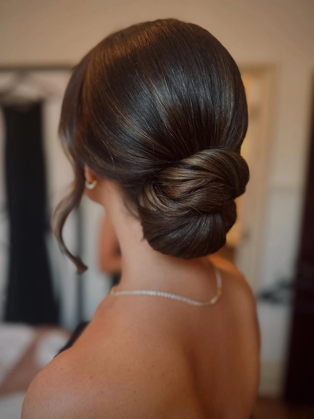 Fall hairstyles for office 2026 Sleek Low Chignon with Sculpted Blonde Finish