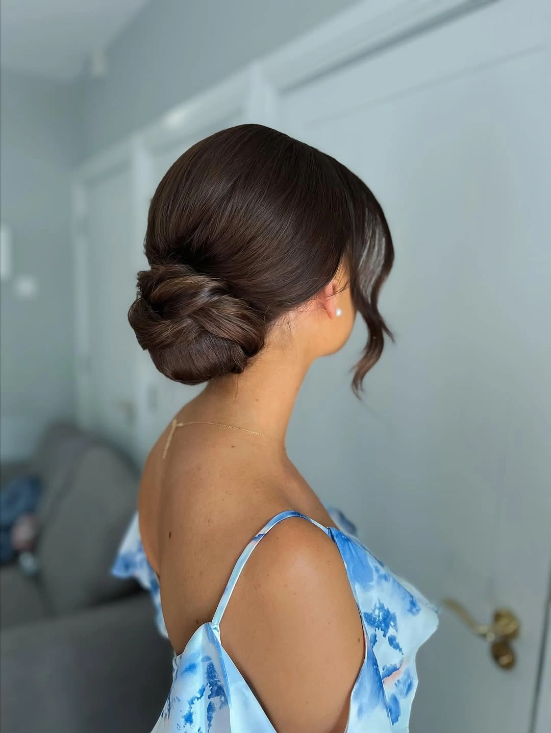 Fall hairstyles for office 2026 Classic Low Office Bun with Timeless Professional Style