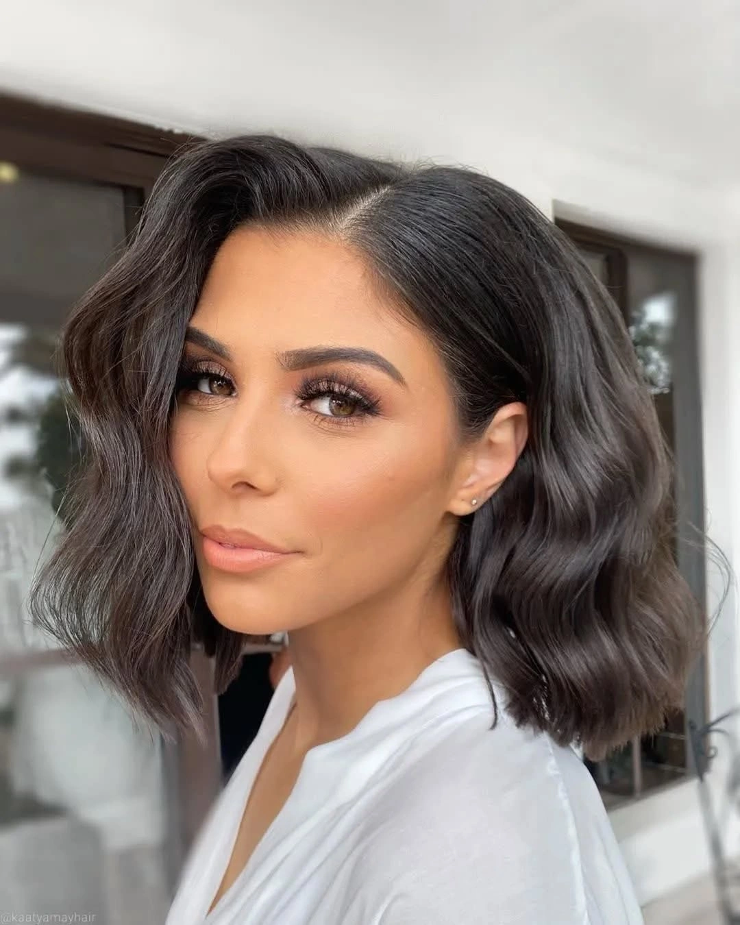 Fall hairstyles for short hair 2026 Hollywood-Inspired Textured Lob with Deep Side Part