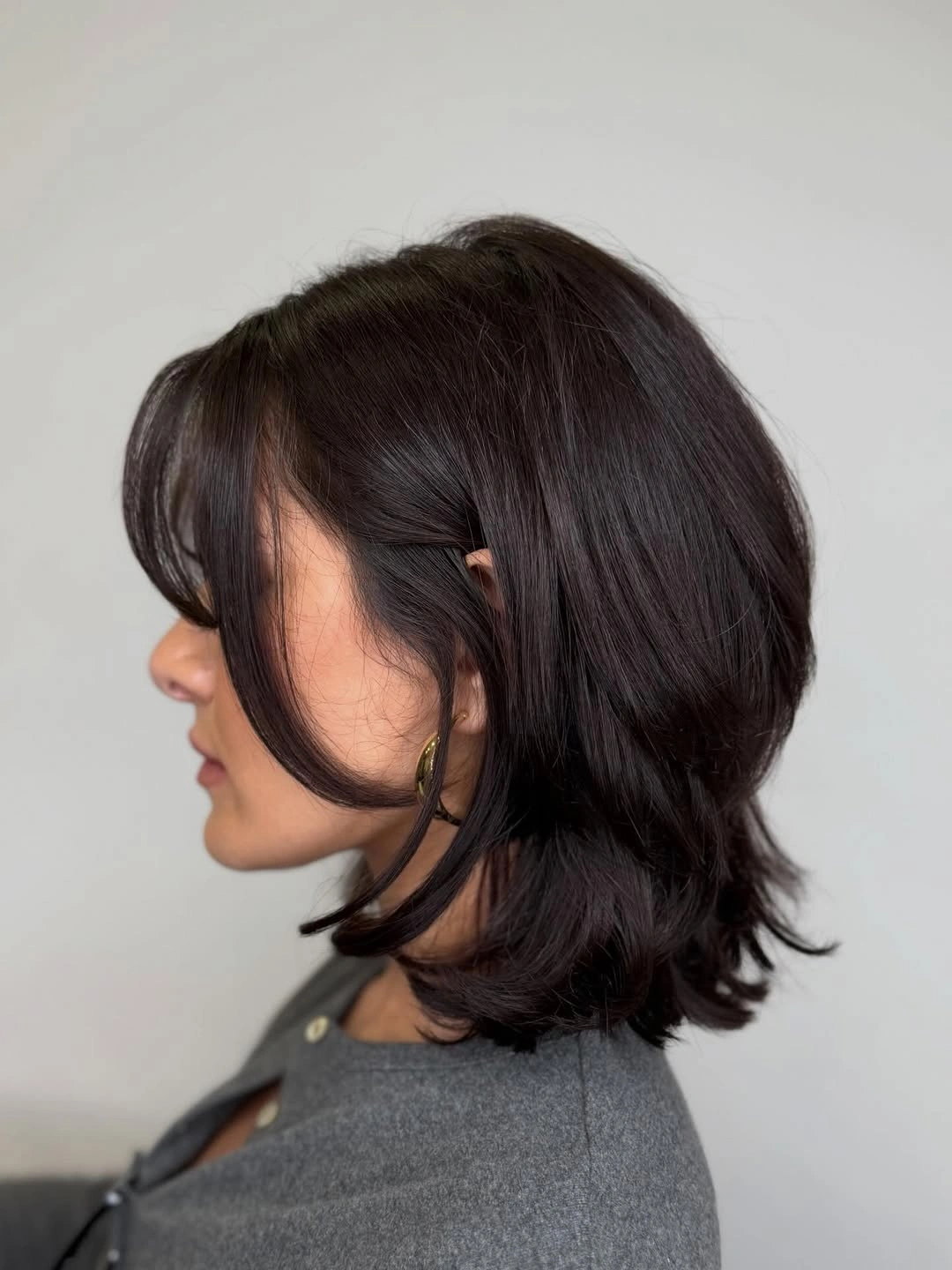 Fall hairstyles for short hair 2026 Layered Italian Bob with Face-Framing Curtain Pieces