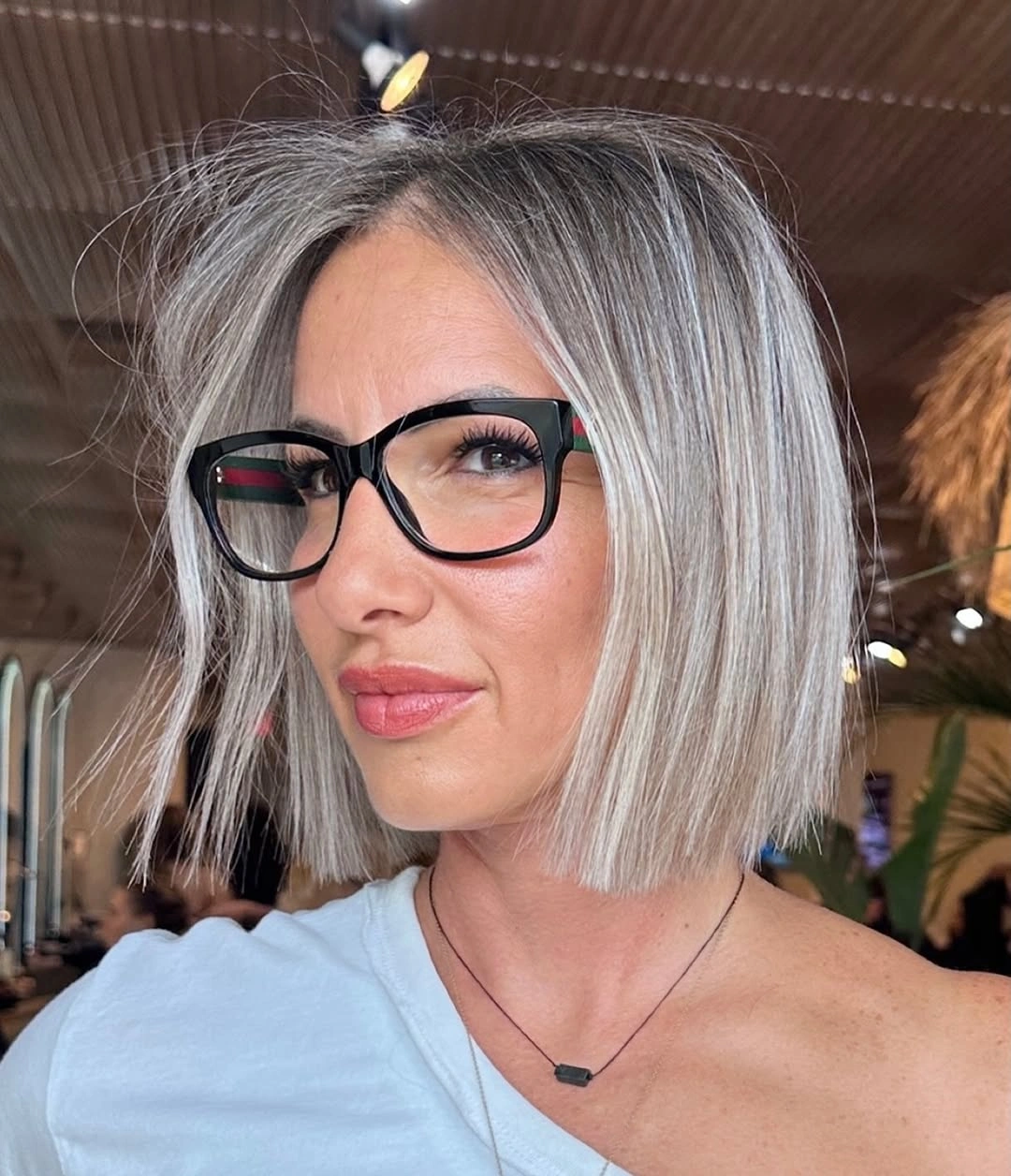Fall hairstyles for short hair 2026 Cool Silver Precision Bob for Modern Confidence